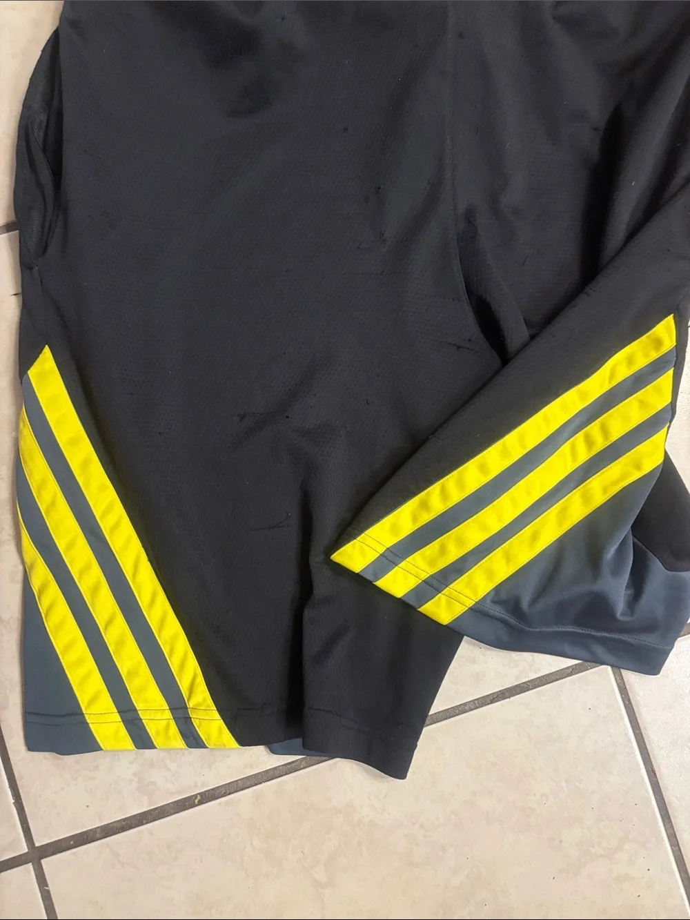 Adidas Black Athletic Shorts with Yellow Stripes